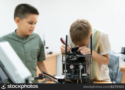 Children using the hand robot technology, Students are studying technology, which is one of the STEM courses.