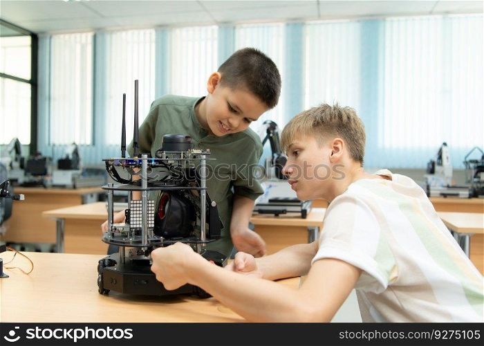 Children using the hand robot technology, Students are studying technology, which is one of the STEM courses.