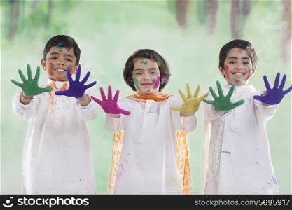 Children with coloured palms