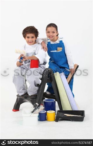 Children with paint cans