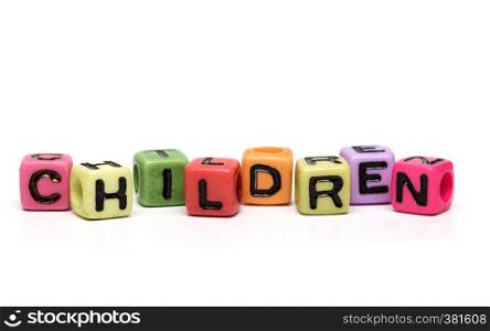 children - word made from multicolored child toy cubes with letters