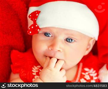 Childrens Christmas party, newborn girl wearing red festive costume, happy childhood, winter holidays, New Year celebration&#xA;