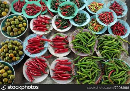 chili and beans at the market in the city of Bandar seri Begawan in the country of Brunei Darussalam on Borneo in Southeastasia.. ASIA BRUNEI DARUSSALAM