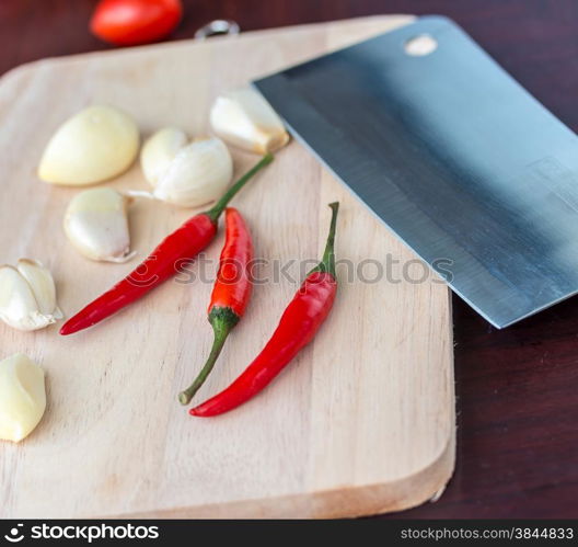 Chilli And Garlic Representing Red Pepper And Peppers