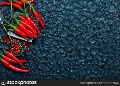 chilli peppers on a table, stock photo
