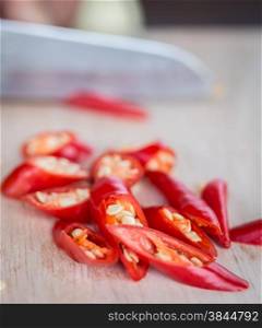 Chillies Being Chopped Showing Chili Pepper And Flavoring