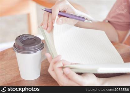 Chilling time for writing in coffee shop, stock photo