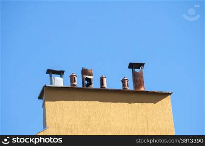 Chimney section of yellow house
