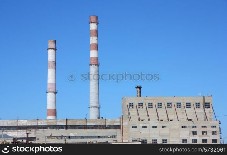 chimneys large plant against the blue sky