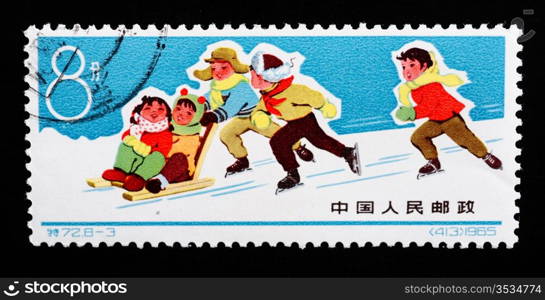 CHINA - CIRCA 1965: A Stamp printed in China shows image of skiing children, circa 1965