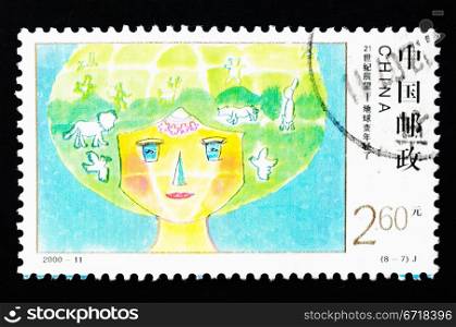 CHINA - CIRCA 2000: A Stamp printed in China shows a glance of the future - the earth becoming younger in the 21st century, circa 2000
