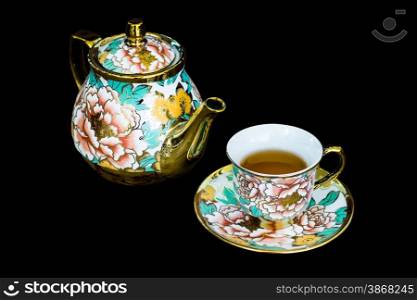 Chinaware tea pod and small drinking bowls isolated with clipping path