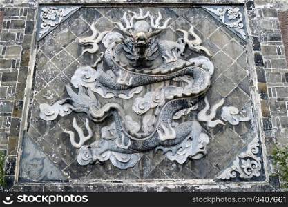 Chinese ancient rock art of dragon carvings