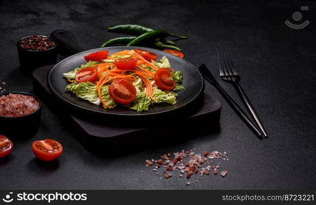 Chinese cabbage with carrots and apples, delicious salad. Vegitarian cuisine. Chinese cabbage with carrots and apples, delicious salad