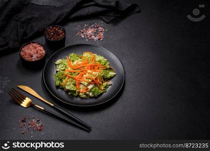Chinese cabbage with carrots and apples, delicious salad. Vegitarian cuisine. Chinese cabbage with carrots and apples, delicious salad