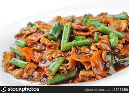 chinese cuisine. deep fried chicken with red sauce and beans