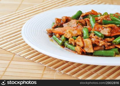 chinese cuisine. deep fried chicken with red sauce and beans