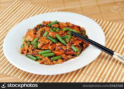 chinese cuisine. deep fried chicken with red sauce and beans