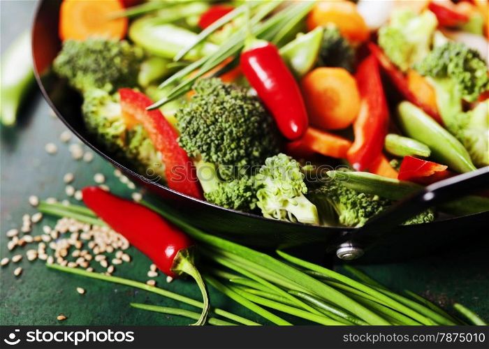 Chinese cuisine. Wok cooking vegetables. Vegetarian wok