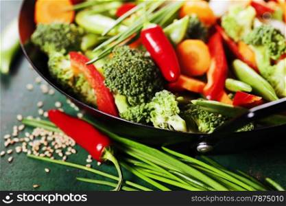 Chinese cuisine. Wok cooking vegetables. Vegetarian wok