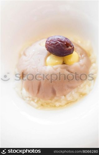 Chinese dessert, Chinese hot sticky rice and taro with ginkgo in sweet syrup