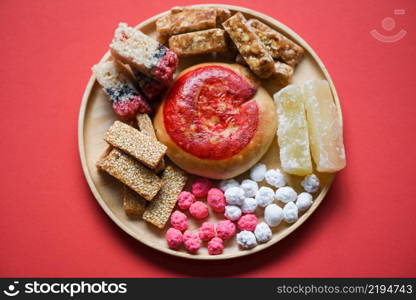 Chinese desserts chinese pastry bean cake, Snack mix nuts candies sweets sugar nuts sesame seeds coated beans puffed rice candied, Thai and chinese pay respect to god in chinese new year festival