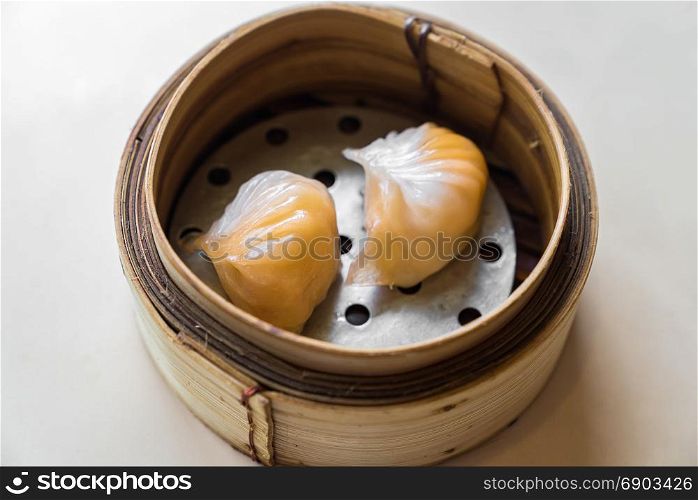 Chinese dim sum in wooden basket