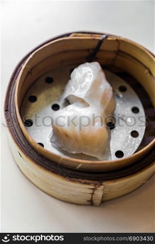 Chinese dim sum in wooden basket
