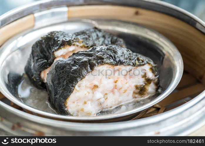 Chinese dim sum seaweed pork dumpling - Steamed Chinese groumet cuisine