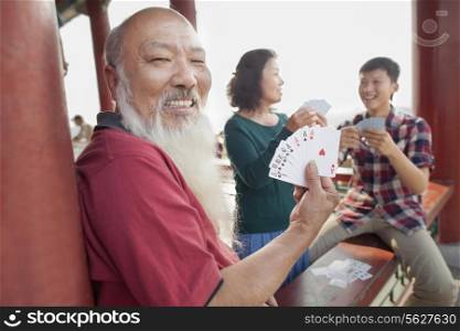 Chinese Family Playing Card In Jing Shan Park