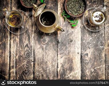 Chinese flavored tea. On a wooden background.. Chinese flavored tea.