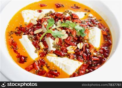 Chinese Food: Boiled Tofu with red pepper in a white plate