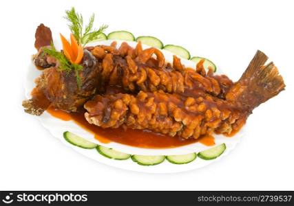 Chinese food. Deep fried carp in sour sweet sauce, previously rolled in starch.
