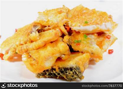 Chinese Food: Fried fish fillets in a white plate