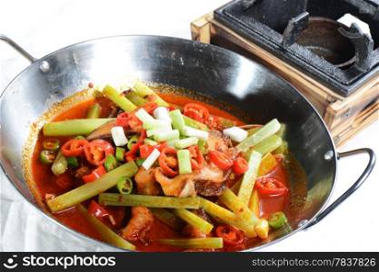 Chinese Food: Fried fish slices with pepper in a pot