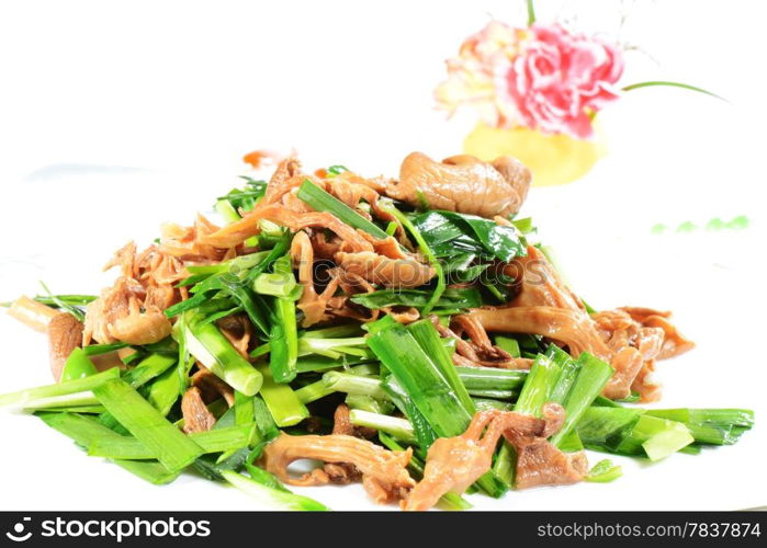 Chinese Food: Fried leek with mushroom in a white plate