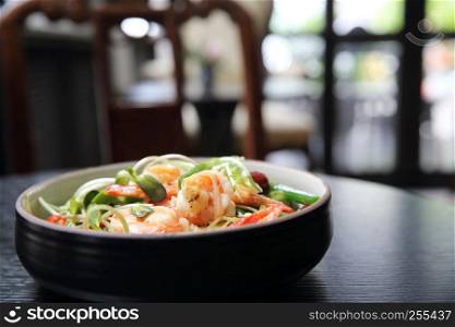 Chinese food shrimp and green vegetable with noodles