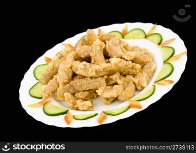 Chinese food. Squid fried in batter, decorated with cucumbers and carrots.