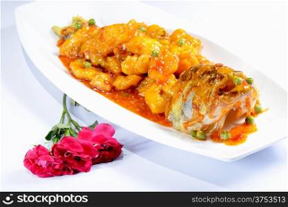 Chinese Food:Sweet and Sour Perch on a white plate