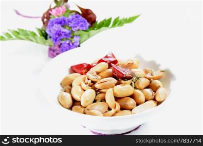Chinese Food: Toasted peanut kernels on a white background