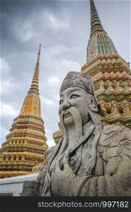 Chinese Guard statue in Wat Pho Buddhist temple, Bangkok, Thailand. Chinese Guard statue in Wat Pho, Bangkok, Thailand