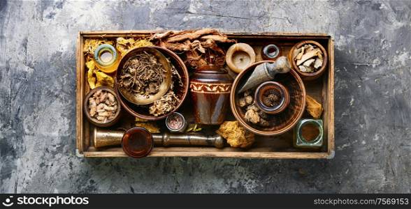 Chinese herbal medicine.Dried medicinal herbs, plants and rhizomes in a box. Alternative medicine herbal