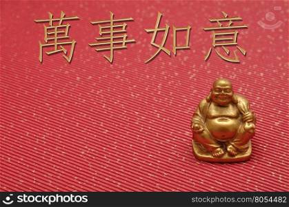 Chinese New Year design. Laughing cheerful Buddha isolated against a red background. Translation : May all your wishes be fulfilled
