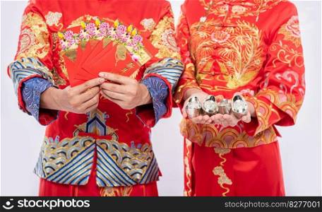 Chinese new year, gift money and cash will be get - give to men and woman wear Cheongsam for traditional