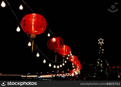 Chinese new year lanterns. Chinese new year background. Chinese characters on the lantern is greeting.