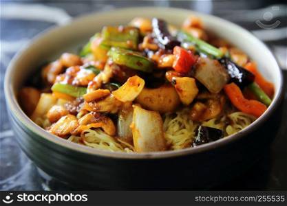 Chinese noodles with chicken and peanuts - Chinese cuisine food