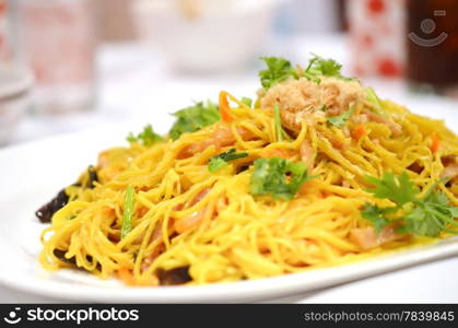 Chinese noodles with ham , mushroom and vegetable