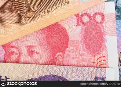 Chinese or 100 Yuan banknotes money from China&rsquo;s currency, close up view as background