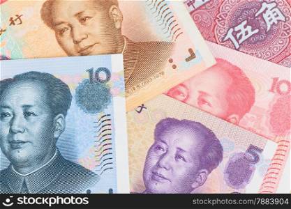 Chinese or Yuan banknotes money from China&rsquo;s currency, close up view as background