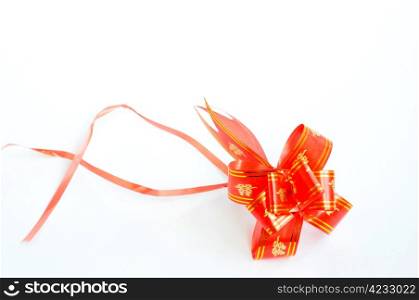 Chinese red auspicious knot isolated on a white background,used for the decorations of wedding invitation cards or new year cards.Blank for text.